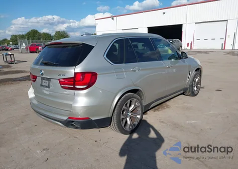 2014 BMW X5 Sdrive35I z USA, uszkodzony, nr VIN 5UXKR2C58E0H33925